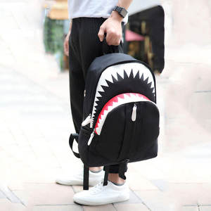 Mini sacs à dos personnalisés en polyester de haute qualité Conception imperméable réfléchissante Sangle USB à fermeture éclair Sac à dos unisexe pour lycéens - Product Image 1