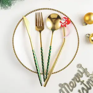 Delicate Christmas Cutlery Gift Matte Gold Flatware Stainless Steel 4pcs Cutlery Set With Santa Claus Printed Handle