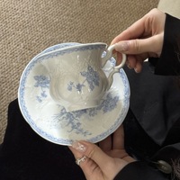 Ensemble de tasses et soucoupes en céramique bleu moderne et frais, motif végétal, pied haut, de haute qualité, pour desserts occidentaux, hôtels et événements