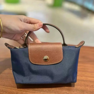 ขอแคตตาล็อกกระเป๋า Dumpling Bag รุ่นกันน้ำฉลองครบรอบ 70 ปี กระเป๋ามินิ กระเป๋าสะพายใต้วงแขน กระเป๋าถือแบบพับได้ รุ่น Longchampes - Product Image 4