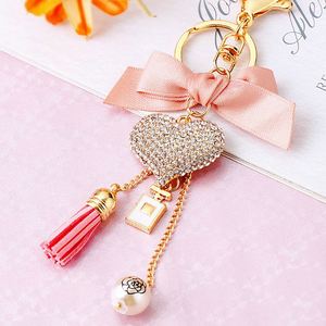 Long lanh pha lê Rhinestone tim Keychain Bling cho phụ nữ cung dễ thương xe tua Ngọc Trai nước hoa chai Keychain phụ kiện quyến rũ - Product Image 4
