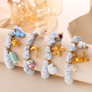 Coleteros de color azul claro con dijes de acero inoxidable, colgante en forma de corazón, accesorios de uso diario FQ01LB - Product Image 2