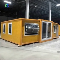 Casa Contenedor de Lujo con Doble Ala Expandible, Paredes de Cristal Completas, Casa Prefabricada Expandible para Acampar Junto al Lago, Uso como Alojamiento de Lujo
