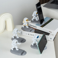 Support de téléphone portable au design créatif de dessin animé 3D d'astronaute, support de tablette cool et amusant, étanche, pour le jeu sur bureau et l'utilisation au lit