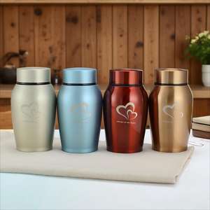 Venta al por mayor de fábrica: Nueva urna para cenizas de mascotas con grabado láser de huella de pata y corazón, para exhibición, entrega rápida, <span class=keywords><strong>precio</strong></span> al por mayor - Product Image 2