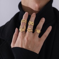 Bague en acier inoxydable plaqué or 18 carats, motif croix exagérée et ondulations argentées, style 'Cold Wind' et 'Alien', pour femmes, cadeau de mode exotique