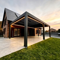 Pergola bioclimatique murale sur mesure en aluminium 6063-T5 avec motorisation et éclairage LED pour projets de terrasses résidentielles