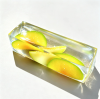 Jouet anti-stress en forme de fruit brillant tendance, soyeux et long, à pétrir, pour un déballage en direct sur les réseaux sociaux
