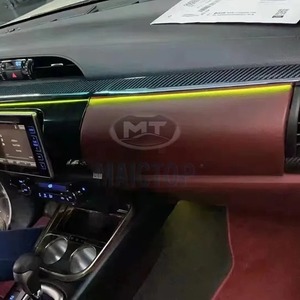 Interior <b>trim</b> for 2016-2021 Toyota Hilux Revo, including dashboard and four-<b>door</b> switch <b>trim</b> panels. - Product Image 4