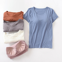 T-shirts de yoga pour femmes à logo personnalisé, respirants, décontractés, d'été, à manches courtes, couleur unie, col rond, séchage rapide, avec coussinet de poitrine