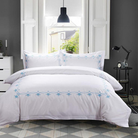 Parure de lit de luxe en coton blanc, draps, housse de couette et taies d'oreiller en gros