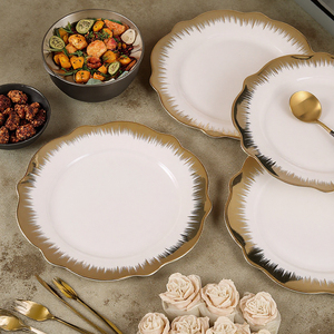 Wholesale Ceramic White Dinner Plate With Gold Rim Round Shape Porcelain <strong>Serving</strong> <strong>Dishes</strong> Plate <strong>Set</strong> For Restaurant - Product Image 1