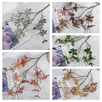 Fabricant de fleurs artificielles : Feuilles d'eucalyptus 'Golden Dragon' hawaïennes pour décoration maison et mariage, vente en gros transfrontalière par injection