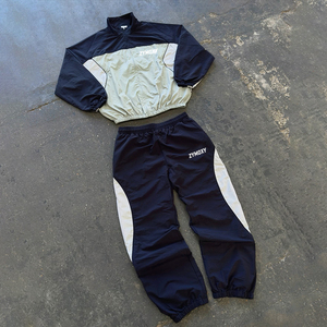 Custom Wholesale <b>Zip</b> <b>Up</b> <b>Jacket</b> And Track Pants Windbreaker Set Design Polyester Sweatsuit Patchwork Windbreaker Set Tracksuit - Product Image 1