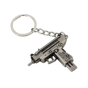 Porte-clés métal 5cm Porte-clés pistolet pendentif Uzi Porte-clés pistolet modèle d'arme 3D jouets mobiles Mini pendentif porte-clés métal pistolet Porte-clés