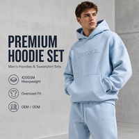 Ensemble de survêtement 2 pièces de luxe pour homme, style streetwear, avec logo imprimé en relief 3D et design artistique, comprenant un sweat à capuche et un pantalon de survêtement épais coupe ajustée