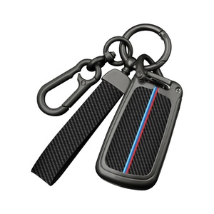 <span class=keywords><strong>Coque</strong></span> de <span class=keywords><strong>clé</strong></span> de voiture en métal et fibre de <span class=keywords><strong>carbone</strong></span> personnalisable en gros avec logo de voiture, nouveau design - Product Image 1