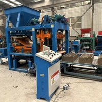 Machine à fabriquer des blocs entièrement automatique QT4-25 populaire sur le marché africain, équipement de fabrication de briques creuses en ciment à faible coût