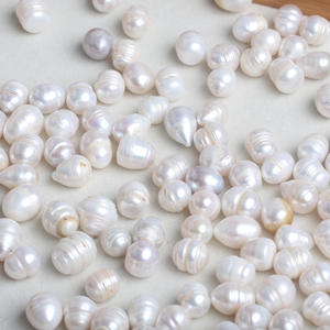 Perles d'eau douce en forme de riz de 12-13 mm en gros de Zhuji, perles filetées blanches, accessoires pour épingles à cheveux DIY, matière première, couleur rose - Product Image 1