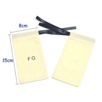 Petite pochette à cordon en toile de coton naturel non blanchi avec logo pour boucles d'oreilles, bagues, bracelets