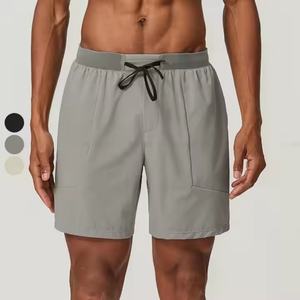 Shorts de sport pour hommes de la marque Fitness Gym avec poches, logo personnalisé, vêtements de sport respirants, shorts de course pour hommes - Product Image 1