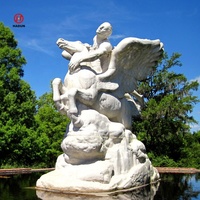 Sculpture grandeur nature en marbre blanc homme et cheval de Marly
