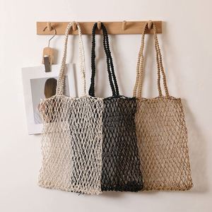 Bolso de Hombro Casual de Moda con Malla Hueca, Bolso Portátil de Paja Tejida, Nuevo Estilo, Bolso de Playa para Vacaciones en la Costa - Product Image 1