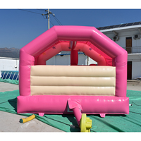 Château gonflable rose en PVC avec toboggan et aire de saut, thème ferme ou licorne, pour fêtes en extérieur dans la cour