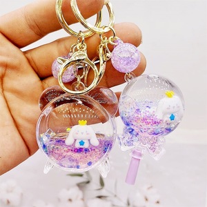 Porte-clés en acrylique avec liquide et <span class=keywords><strong>sable</strong></span>, motif Cinnamoroll chien bleu aux grandes oreilles, jouet en peluche flottant, petit pendentif dessin animé mignon irrégulier - Product Image 2