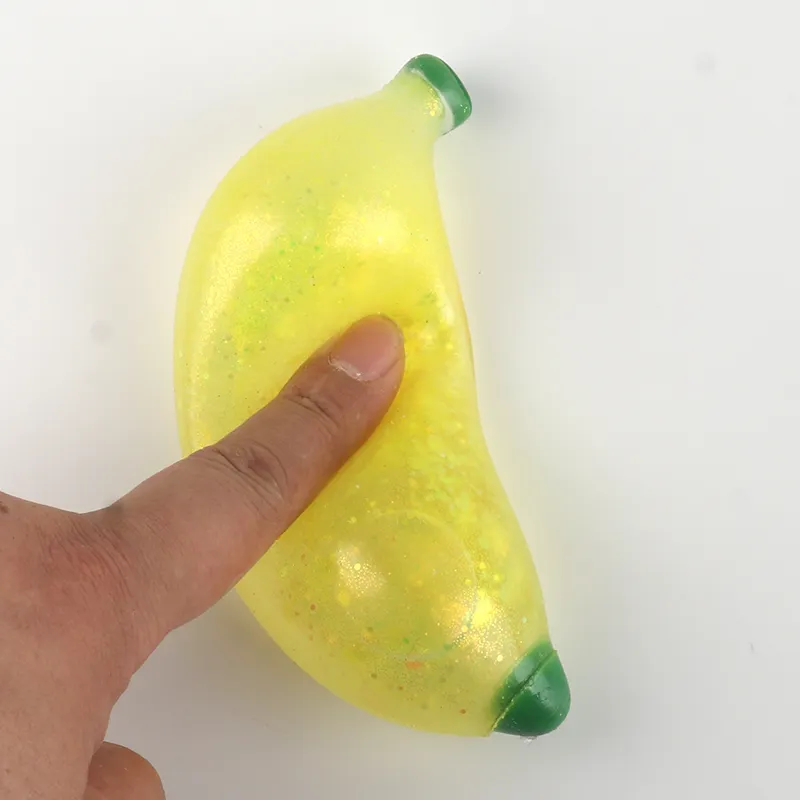Sensorial brinquedo de estresse água e brilhante cheio de apertar frutas descompressão liberação de pressão esguichar banana com glitter