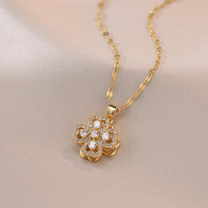 Joyería <span class=keywords><strong>de</strong></span> mujer Cz diamante doble capa giratoria <span class=keywords><strong>4</strong></span> trébol <span class=keywords><strong>de</strong></span> cuatro <span class=keywords><strong>hojas</strong></span> colgante 18K oro Acero inoxidable titanio collar - Product Image 1