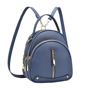 กระเป๋าผ้าอ้อมหนังวัวแท้สไตล์ตะวันตก งานแฮนด์เมด ลายสลัก  ประดับด้วยหินสีฟ้าคราม  กระเป๋าเป้สะพายหลังสั่งทำได้ ขายส่ง สำหรับทุกเพศ  รุ่นใหม่ ขายดี - Product Image 1