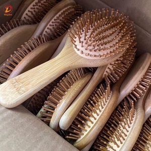 Precio de fábrica OEM Cepillo de pelo de <span class=keywords><strong>bambú</strong></span> Cepillo de paleta natural para ablandar Masaje calmante Peine de madera ecológico para todo tipo de cabello - Product Image 2