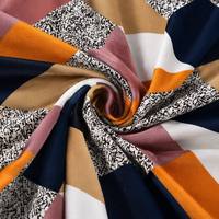 Tissu tricoté en soie de lait et élasthanne/polyester à motif imprimé, extensible, respirant et résistant aux plis pour housses de canapé et de chaise – Vente directe usine