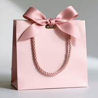 Sac en papier de luxe à prix avantageux pour le commerce de détail, sacs d'emballage personnalisés pour vêtements