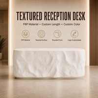 Bureau de réception commercial de luxe monolithique en FRP, ovale et arrondi, aspect pierre texturée, style moderne et organique, avec logo personnalisé pour salon et spa