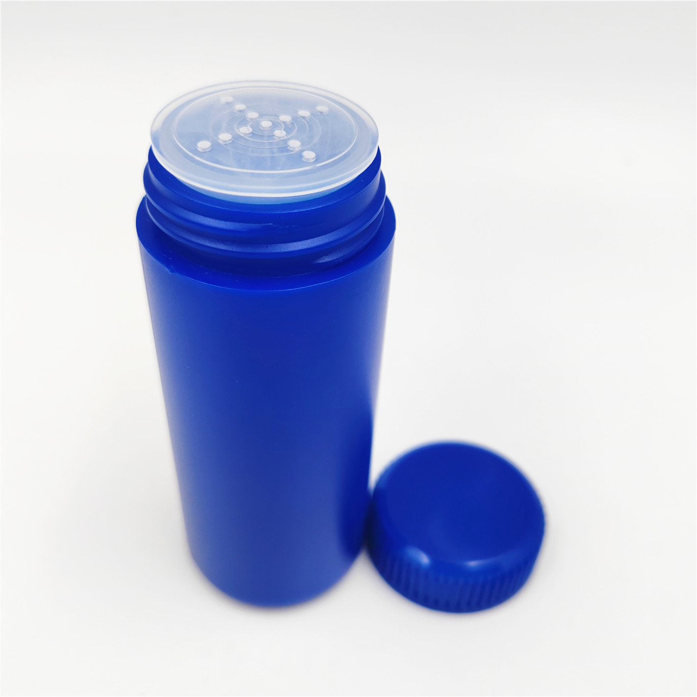 Bouteille en plastique de 60ml noir blanc bleu couleur avec tamis et bouchon bouteille distributeur de poudre sèche bouteille 2oz en plastique bébé talc bouteille de poudre