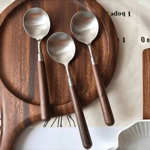Stainless Steel Spoon With Imitation Walnut Wood Handle Round Spoon For Household Restaurant Use Durable Solid Color Design - Product Image 1