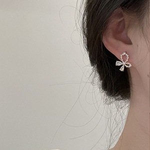 Élégantes boucles d'oreilles clous en argent avec nœud papillon blanc, aiguilles en argent 925, style Ins, boucles d'oreilles légères et luxueuses pour femmes - Product Image 6