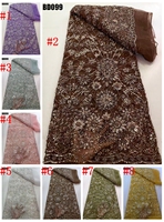 Tissu en dentelle brodé de perles et de paillettes, prix usine Chine, collection 2026, idéal pour mariages et célébrations