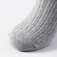 Vente en gros de chaussettes d'hiver confortables pour hommes épaisses, chaudes et respirantes avec motif à pois, agréablement parfumées pour le froid extrême