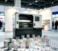 Imprimante UV cylindrique haute vitesse avec empileur d'encre, entretien facile, machine d'impression rotative pour la production en série de tasses et de bouteilles