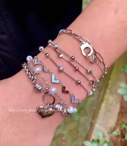 Stainless steel silver joyas heart-shaped bracelet with pendant couple handcuff chain bracelet wholesale pearl bracelet of party