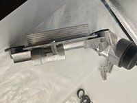 Rakitan Rumah Filter Oli dengan Pendingin untuk 12992593 25199751 55353322 55571687 93186324 untuk Chevrolet Cruze Sonic Tracker 1.8l
