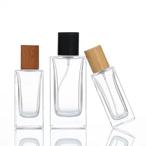 Botol parfum kaca transparan mewah 30ml 50ml 100ml penutup kayu persegi botol semprot kaca botol kemasan parfum-