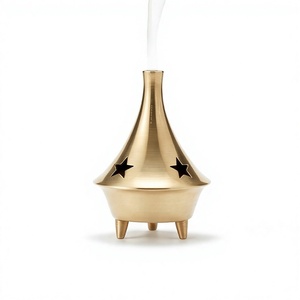 Quemador de Incienso Decorativo con Forma de Campana Dorada, con Recortes de Estrellas y Soporte de Trípode para Yoga, Meditación y Spa - Product Image 1