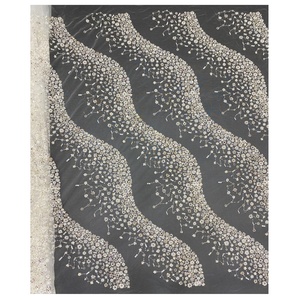 Competitive Price Bridal <strong>Lace</strong> <strong>Fabric</strong> Wholesale <strong>Heavy</strong> <strong>Lace</strong> Embroidery <strong>Fabrics</strong> Wedding Dress Pearl Beaded Bridal <strong>Lace</strong> <strong>Fabric</strong> - Product Image 1