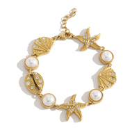 Bracelet en acier inoxydable plaqué or 18 carats avec étoile de mer, coquillage et perle pour femme, breloque CZ thème océan et plage, vente en gros OEM