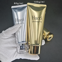 Vente en gros de tubes cosmétiques ABL de luxe en or et argent de 80 ml et 100 ml, tubes à presser pour crème pour le corps, avec bouchon en acrylique