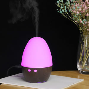 Diffuseur d'arômes USB rond pour exportation transfrontalière, humidificateur 5V à changement de couleur, petit purificateur d'air de bureau avec lumières dégradées - Product Image 1